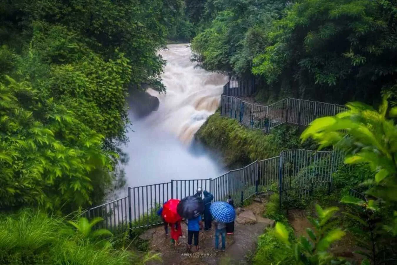 A monsoon waterfall in the green forest near Pokhara